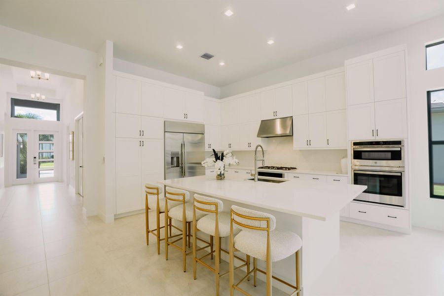 Furnished interior view inside a new home in Lotus Edge, Boca Raton (Image 5). Furnished interior view inside a new home in Lotus Edge, Boca Raton (Image 5).