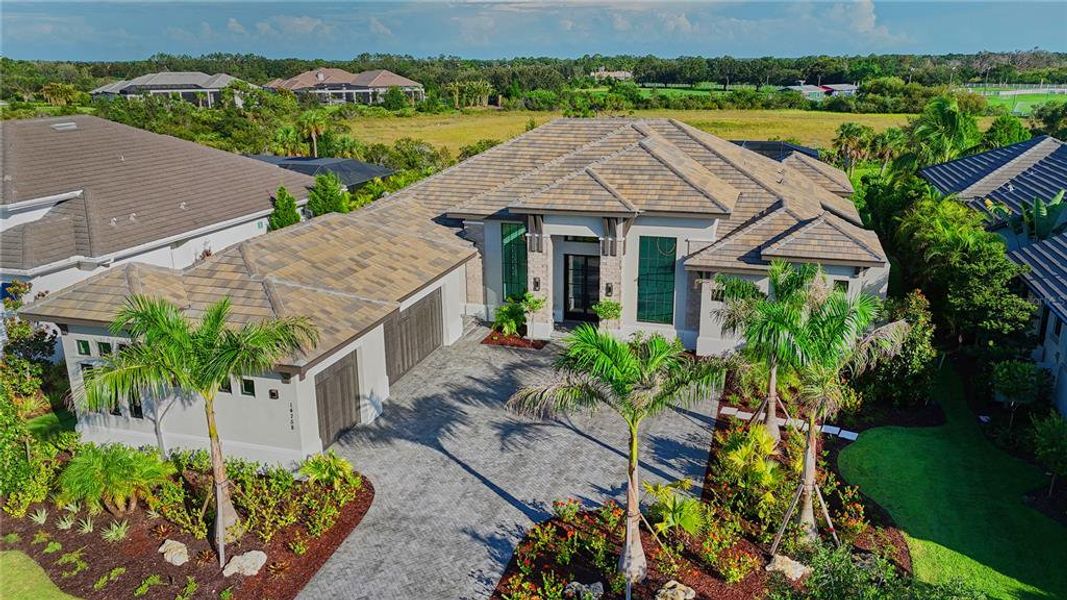 Front exterior of a new home in , Bradenton, FL, highlighting curb appeal (Image 29).