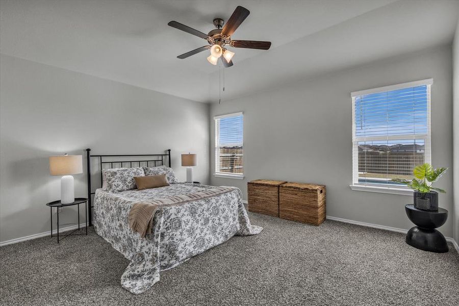 The primary bedroom is spacious and offers multiple layout options, plus a view of the pool.