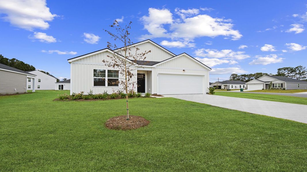 Representative exterior photo of a completed home built from the Freeport by D.R. Horton in The Groves at Bees Creek, Ridgeland, SC (Image 24).