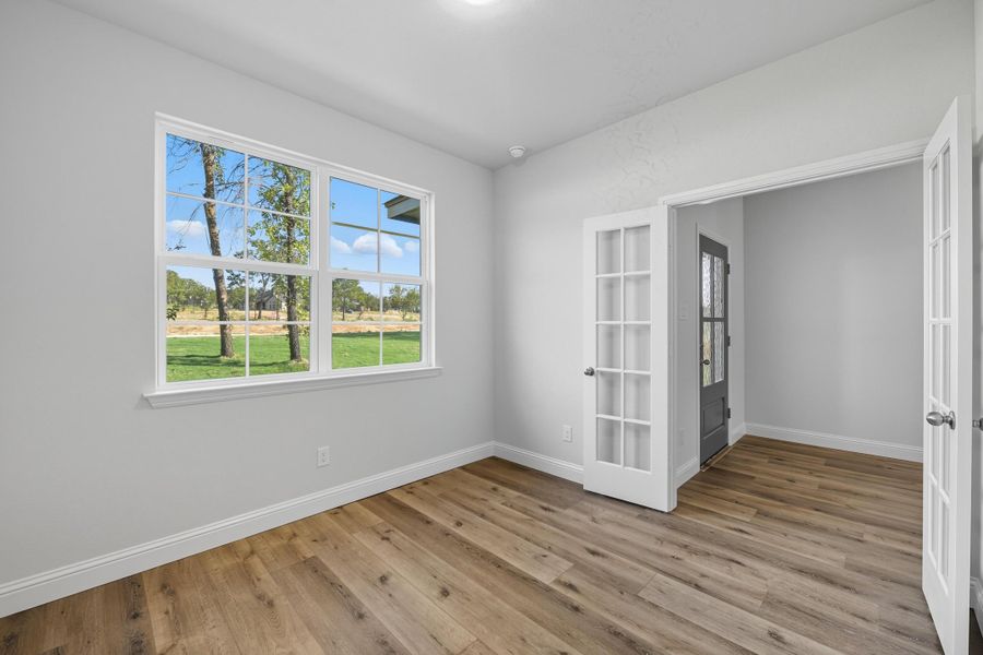 Representative unfurnished interior of a home built from the Garrison III by Cheldan Homes in Arbor Oaks, Boyd (Image 13).