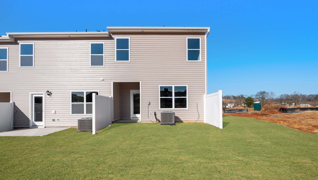 Exterior details and patio area of a home in Covington Village, Greer (Image 3).