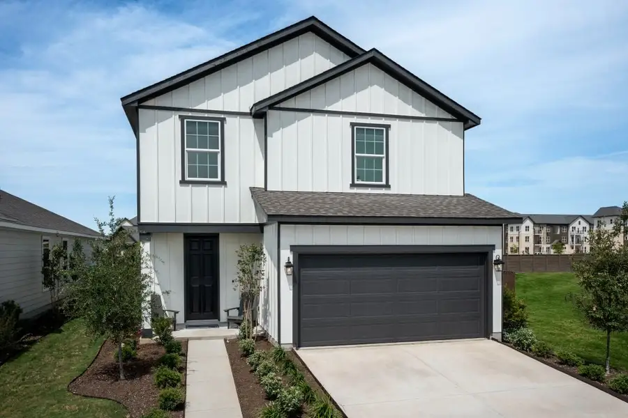 Representative exterior photo of a completed home built from the 2071 Modeled by KB Home in Sunset Oaks, Maxwell, TX (Image 18).