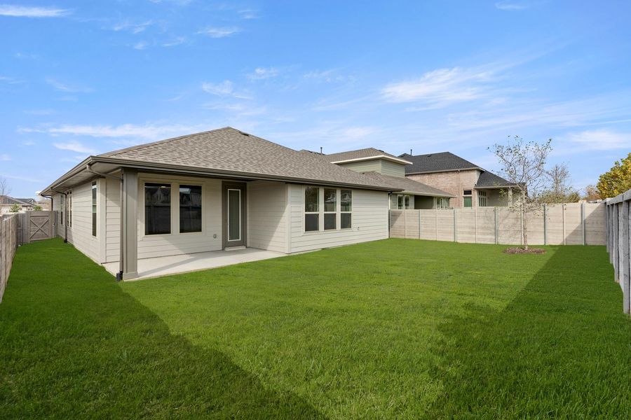 Exterior details and patio area of a home in Discovery Collection at Painted Tree Village, McKinney (Image 18). Exterior details and patio area of a home in Discovery Collection at Painted Tree Village, McKinney (Image 18).