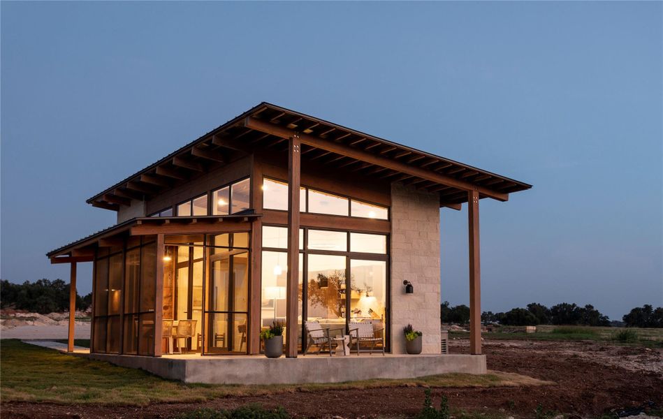 Front exterior of a new home in Hye Springs Ranch, Hye, TX, highlighting curb appeal (Image 1). Front exterior of a new home in Hye Springs Ranch, Hye, TX, highlighting curb appeal (Image 1).