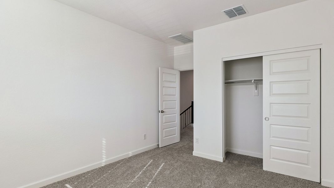 Spacious, unfurnished interior of a new home in Apache Farms, Buckeye (Image 36).