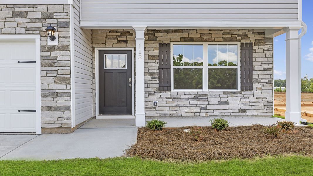 Exterior details and patio area of a home in Spring Ridge, Anderson (Image 2). Exterior details and patio area of a home in Spring Ridge, Anderson (Image 2).