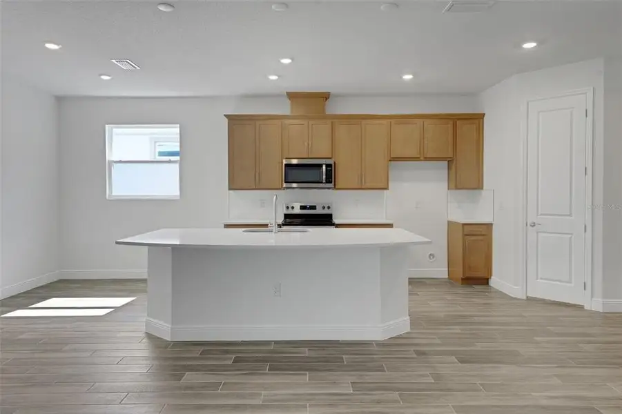 Furnished interior view inside a new home in Angeline, Land O' Lakes (Image 9).
