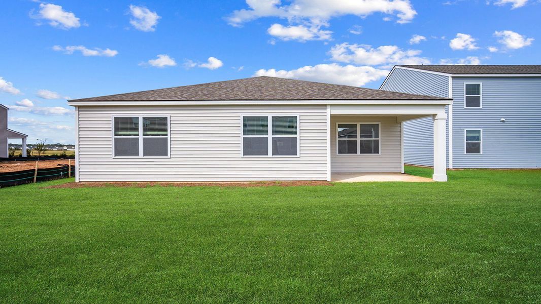 Exterior details and patio area of a home in Palm Ridge, Guyton (Image 2).