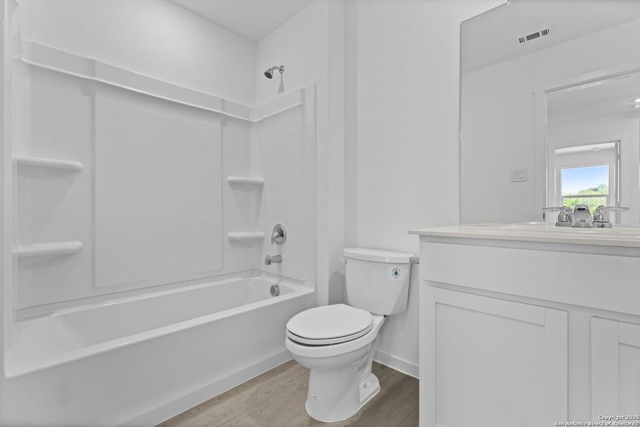 Furnished interior view inside a new home in Lodi Grove, Floresville (Image 3).