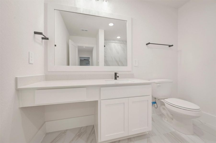 Furnished interior view inside a new home in The Oaks on 6th Street, Magnolia (Image 7).