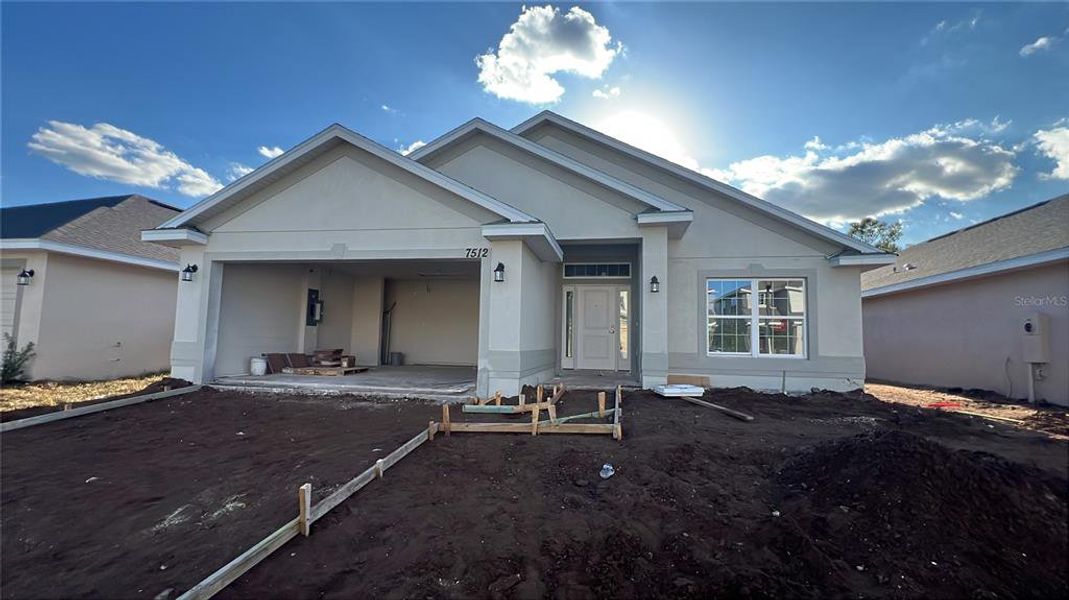 In-progress construction of a new home in Harmony Central, St. Cloud, FL (Image 1).