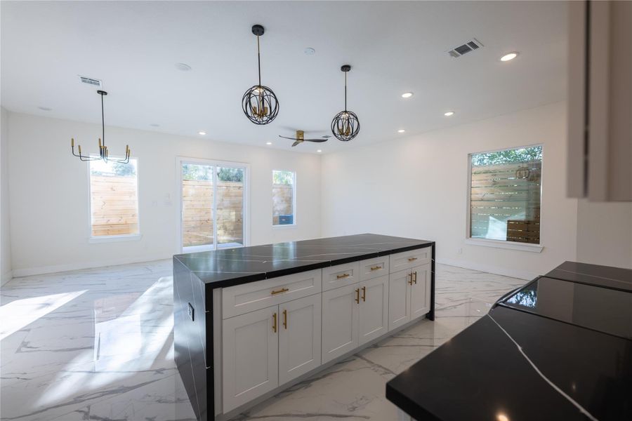 Waterfall Island allows for extra seating space. Waterfall Island allows for extra seating space.