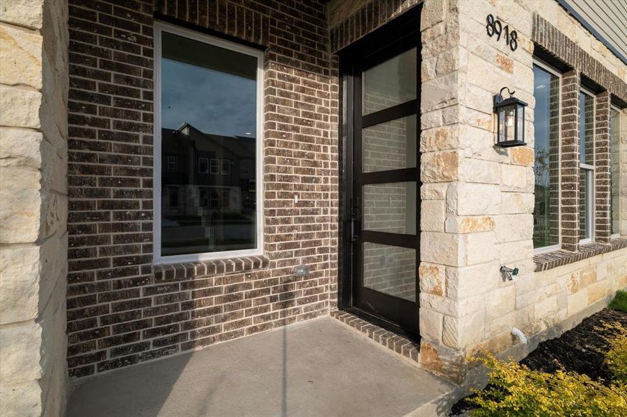 View of front entry with brick siding View of front entry with brick siding