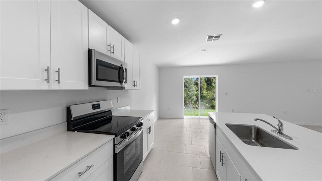 Furnished interior view inside a new home in , Port Charlotte (Image 6).