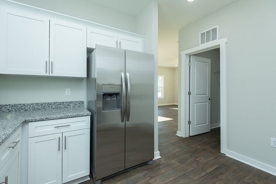 Representative furnished interior of a home built from the Marshall by Foundation Home Builders LLC in Pinnix Loop, Burlington (Image 9).