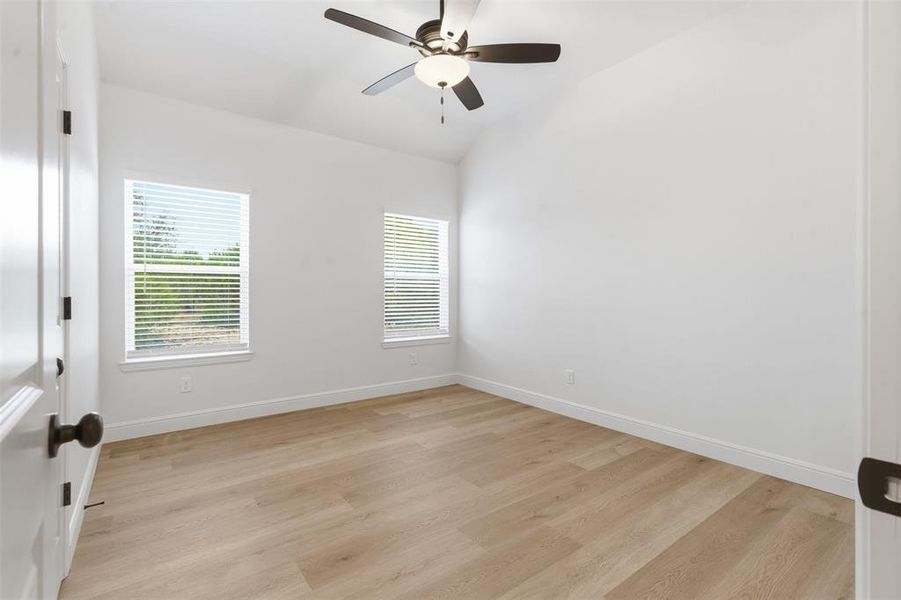 View from above of property featuring a heavily wooded area View from above of property featuring a heavily wooded area