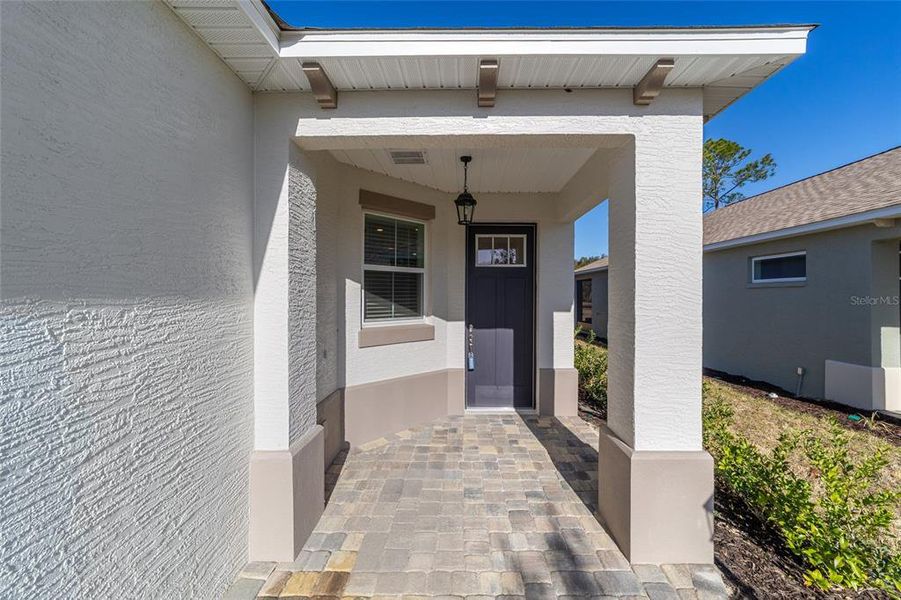 Exterior details and patio area of a home in On Top of the World Communities, Ocala (Image 24).