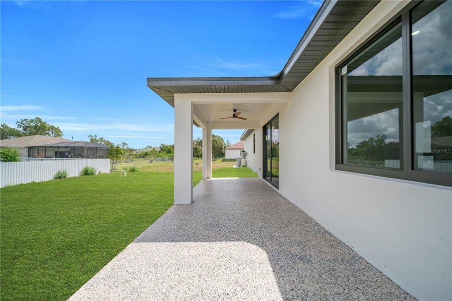 Exterior details and patio area of a home in , Lehigh Acres (Image 24). Exterior details and patio area of a home in , Lehigh Acres (Image 24).