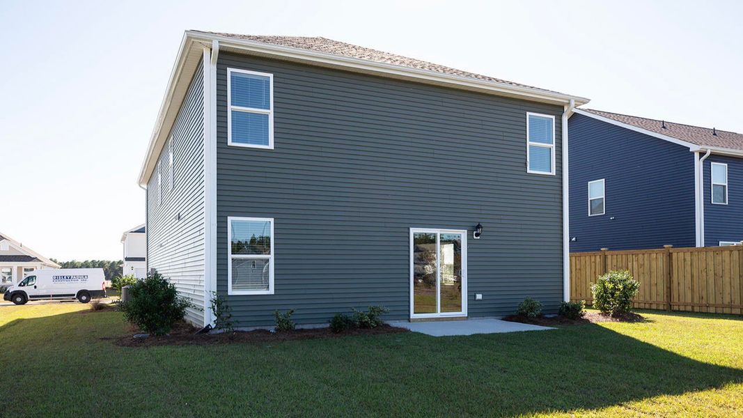 Exterior details and patio area of a home in Sidbury Station, Castle Hayne (Image 3).