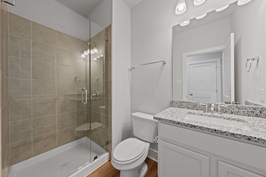 Representative furnished interior of a home built from the Austen by Omega Builders in North Point, Temple (Image 11).
