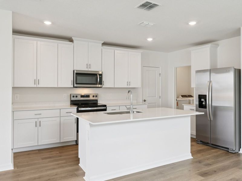 Furnished interior view inside a new home in The Reserve at Hammock Oaks - Classic Series, Lady Lake (Image 4).