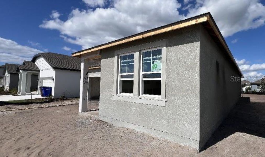 Exterior details and patio area of a home in Sunbrooke, St. Cloud (Image 4).
