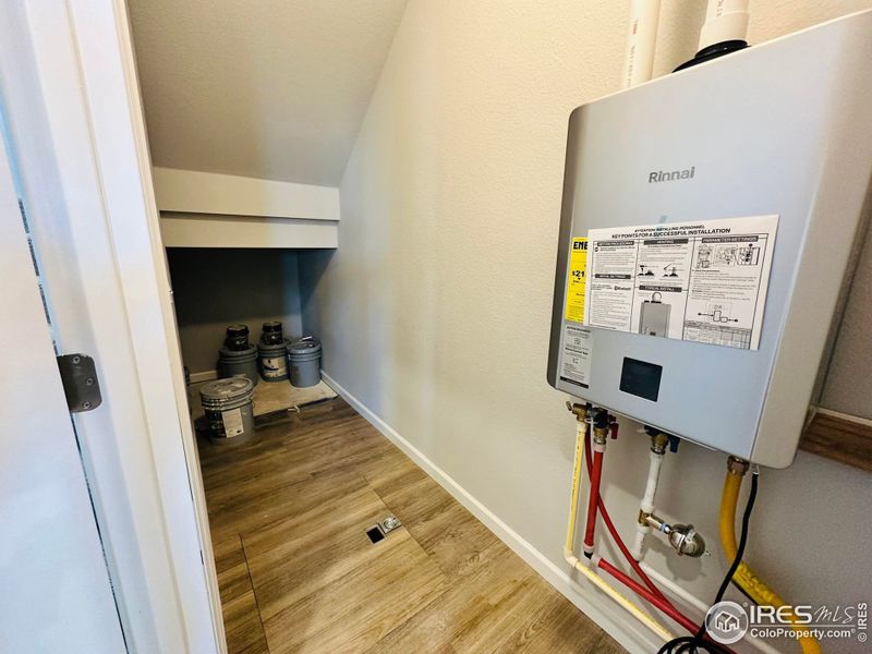 Extra storage, access to crawl space and tankless hot water heater, for instant, on demand hot water