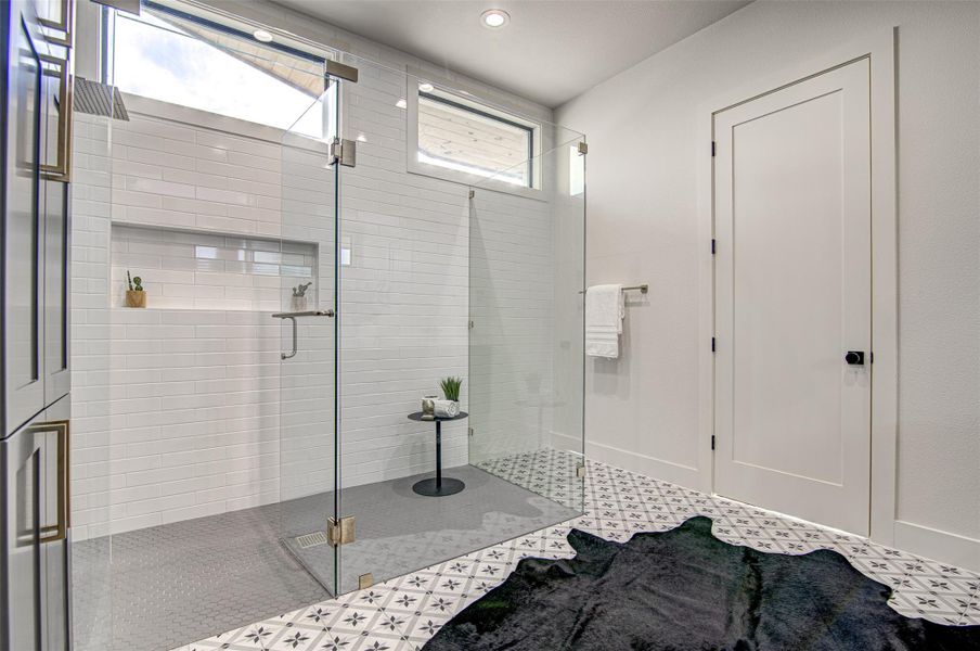 Bathroom featuring a stall shower and recessed lighting Bathroom featuring a stall shower and recessed lighting