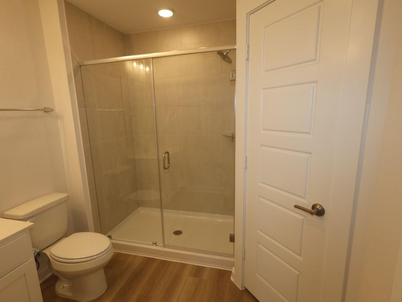 Furnished interior view inside a new home in Pinewood at Grand Texas, New Caney (Image 6).