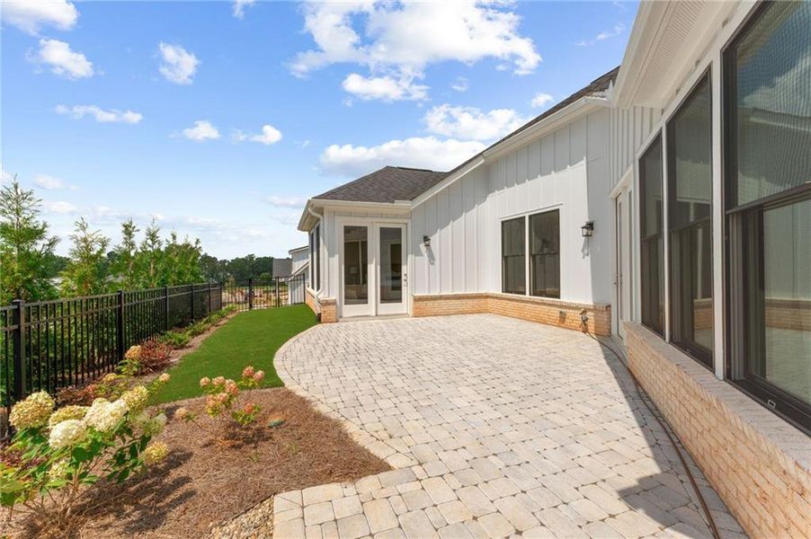 Front exterior of a new home in The Courtyards of Franklin Goldmine, Cumming, GA, highlighting curb appeal (Image 20).