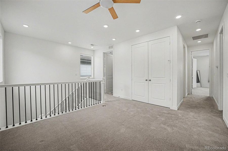 Spacious, unfurnished interior of a new home in Red Rocks Ranch, Morrison (Image 40).