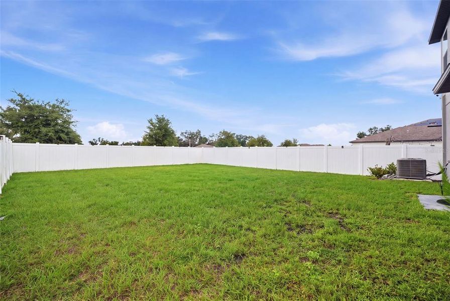 Exterior details and patio area of a home in , Zephyrhills (Image 32).