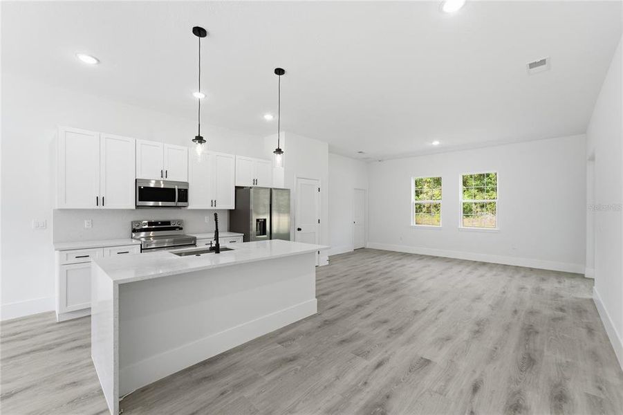Furnished interior view inside a new home in , Dunnellon (Image 10).
