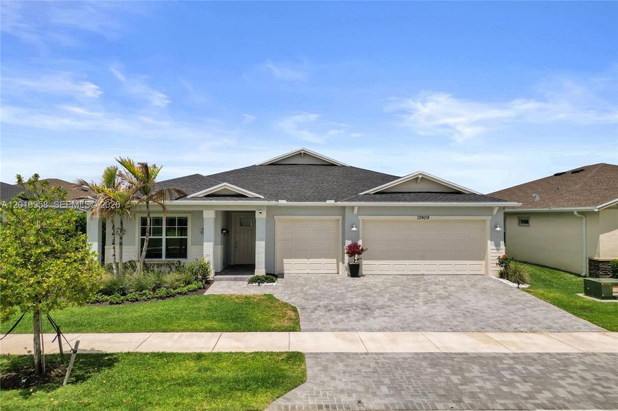 Front exterior of a new home in , Port St. Lucie, FL, highlighting curb appeal (Image 26). Front exterior of a new home in , Port St. Lucie, FL, highlighting curb appeal (Image 26).