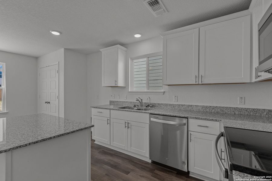 Furnished interior view inside a new home in Lily Springs, Seguin (Image 2). Furnished interior view inside a new home in Lily Springs, Seguin (Image 2).