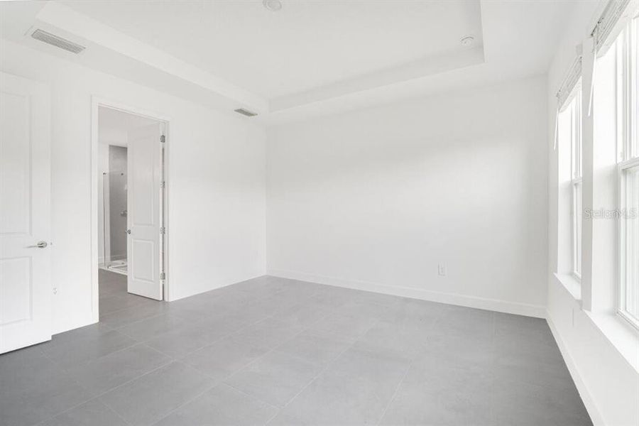 Spacious, unfurnished interior of a new home in Harvest at Ovation, Winter Garden (Image 34). Spacious, unfurnished interior of a new home in Harvest at Ovation, Winter Garden (Image 34).