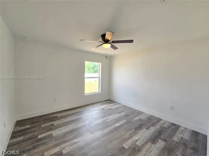 Spacious, unfurnished interior of a new home in , Port Charlotte (Image 19).