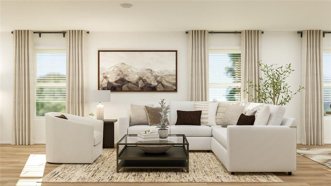 Living room with light hardwood / wood-style flooring