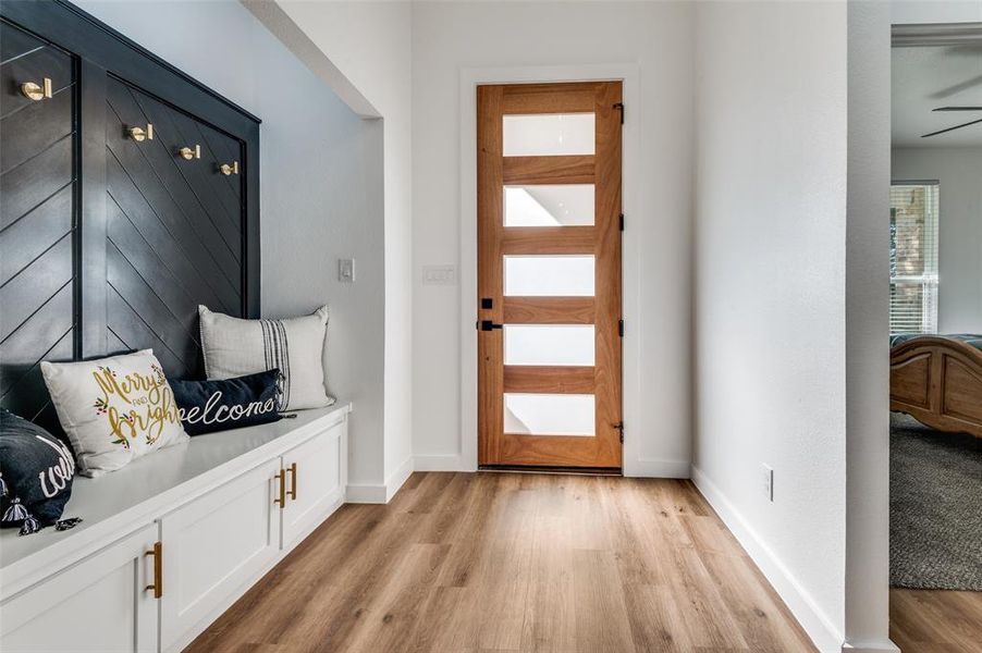 Foyer featuring light wood-style flooring