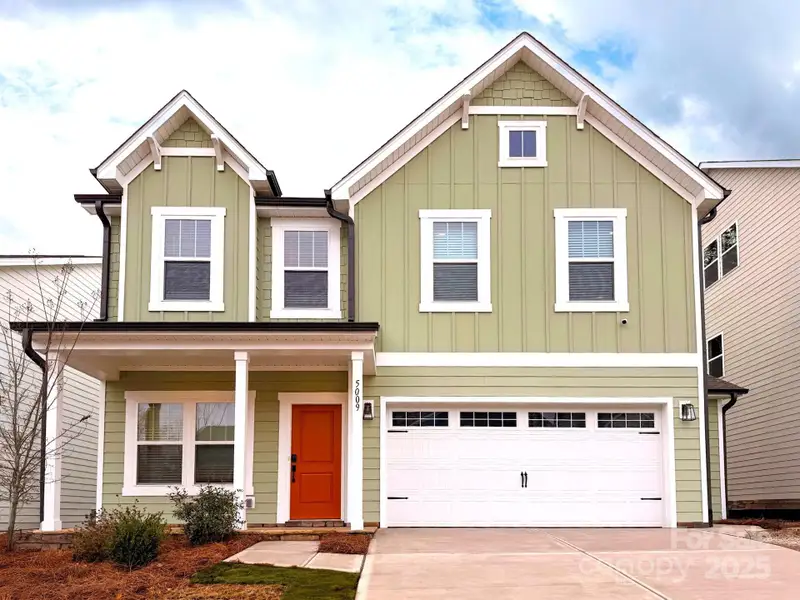 Front exterior of a new home in Mooreland Oaks, Mount Holly, NC, highlighting curb appeal (Image 1).