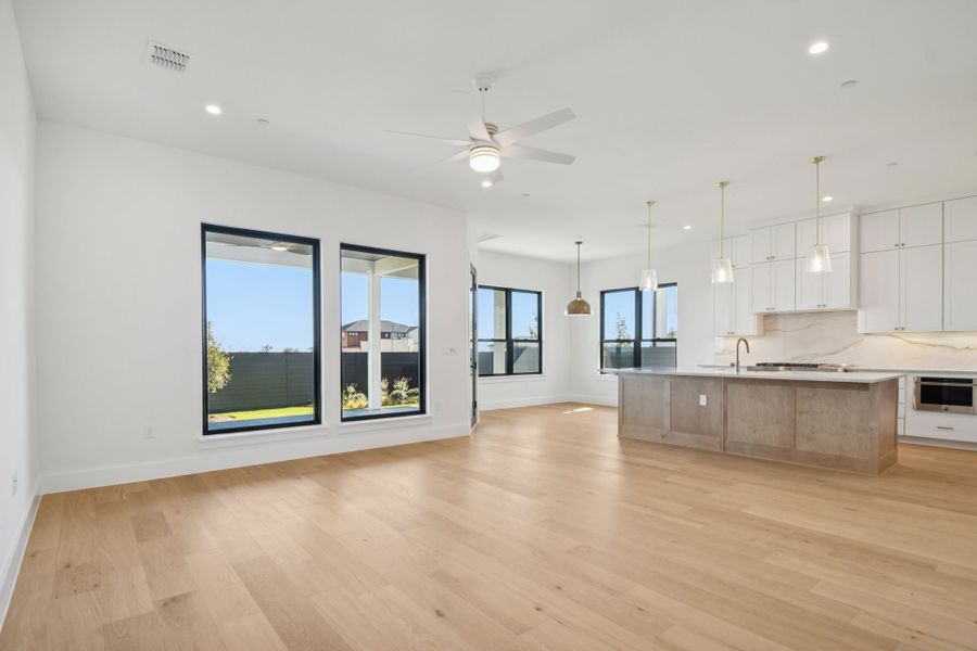 Spacious, unfurnished interior of a new home in Milky Way at River Place, Austin (Image 41).