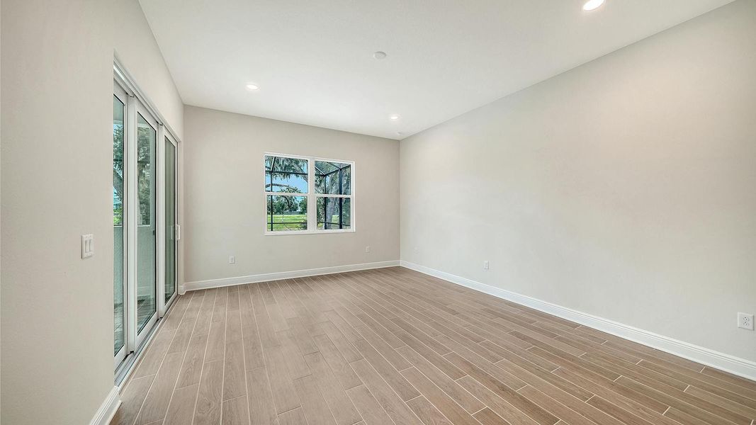 Spacious, unfurnished interior of a new home in Canoe Creek Real Estate and Homes for Sale in Parrish, FL - Neal Communities, Parrish (Image 39).