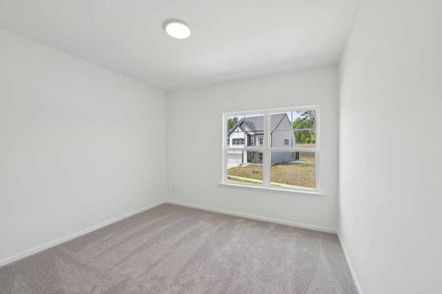 Representative unfurnished interior of a home built from the Jordan by Ashton Woods in Rowland's Grant, Fuquay Varina (Image 25).