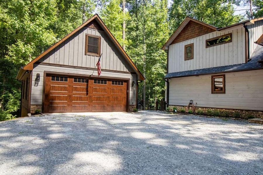 Front exterior of a new home in , Blue Ridge, GA, highlighting curb appeal (Image 21).