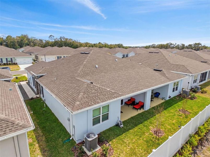 Exterior details and patio area of a home in Park Ridge Villas, Spring Hill (Image 23).