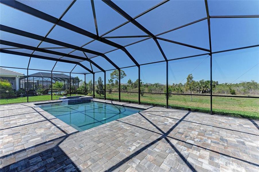 Exterior details and patio area of a home in EVERLY at Wellen Park, Venice (Image 25).