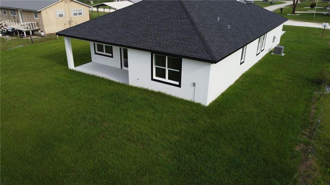 Exterior details and patio area of a home in , Summerfield (Image 4).