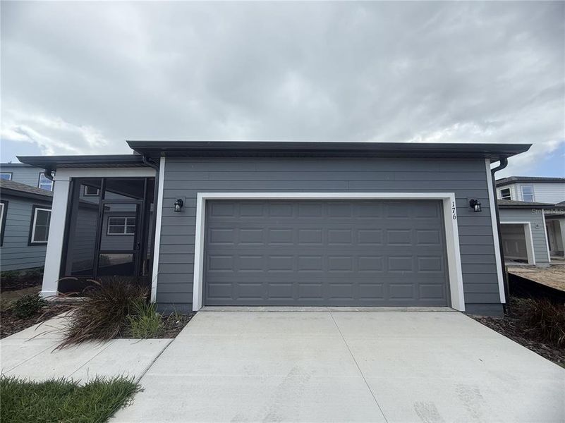 Exterior details and patio area of a home in Northlake Classical, Winter Garden (Image 19).