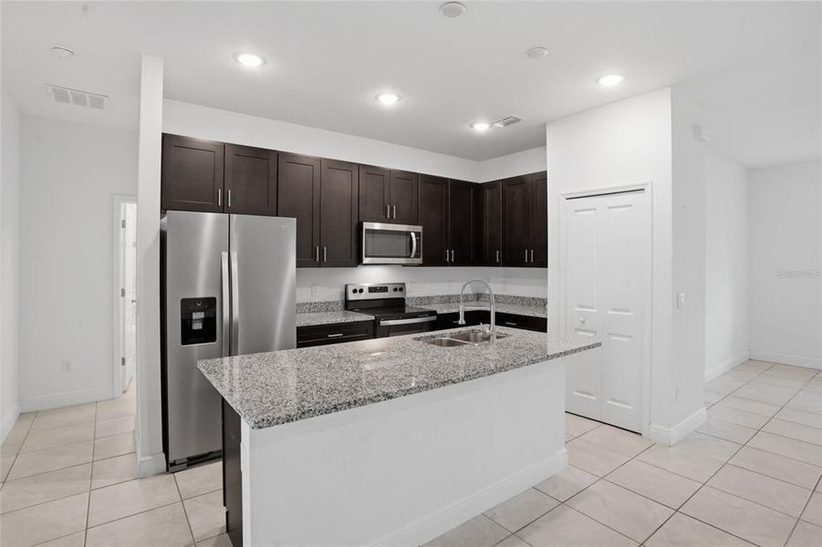 Furnished interior view inside a new home in , Kissimmee (Image 8).